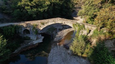 Old stone bridge Kaber Aga, Zagoritikos river, aerial view, Zagori, Epirus, Greece