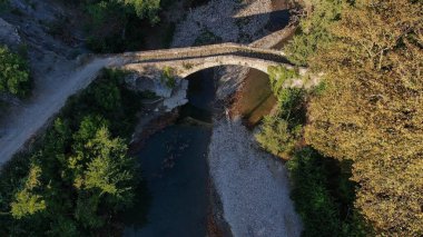 Old stone bridge Kaber Aga, Zagoritikos river, aerial view, Zagori, Epirus, Greece