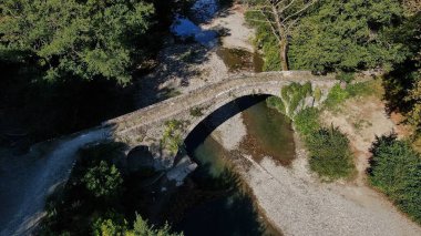 Old stone bridge Kaber Aga, Zagoritikos river, aerial view, Zagori, Epirus, Greece