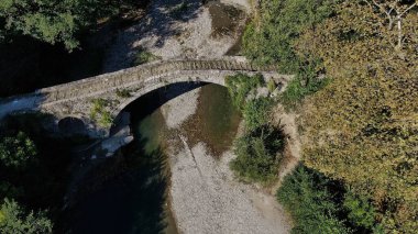 Old stone bridge Kaber Aga, Zagoritikos river, aerial view, Zagori, Epirus, Greece