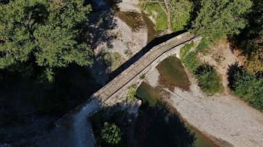 Old stone bridge Kaber Aga, Zagoritikos river, aerial view, Zagori, Epirus, Greece