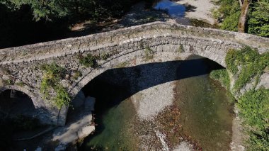 Old stone bridge Kaber Aga, Zagoritikos river, aerial view, Zagori, Epirus, Greece