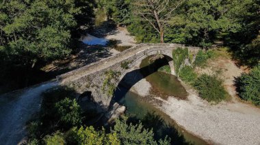 Old stone bridge Kaber Aga, Zagoritikos river, aerial view, Zagori, Epirus, Greece