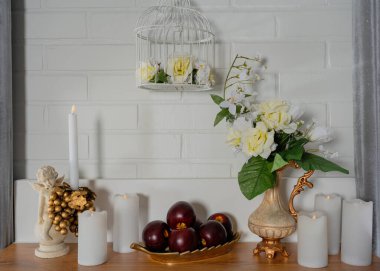 Old style room interior by fireplace with vintage armchair
