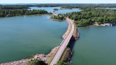 Flying over an island road in northern Europe