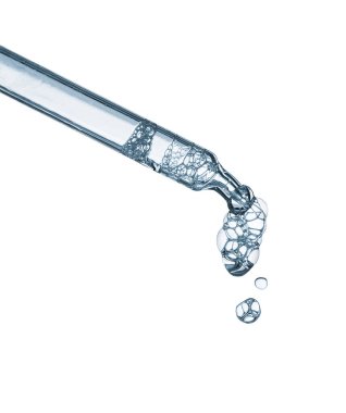 Kabarcıklı kozmetik damlatıcısı beyaz arkaplanda izole edilmiş yakın plan baloncuklar