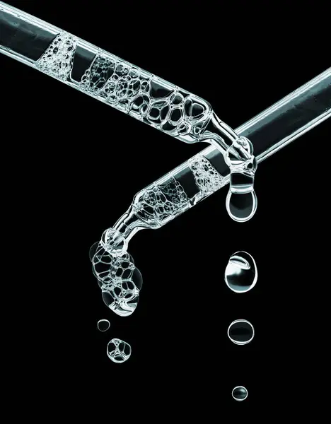 Två Kosmetiska Dropper Med Bubblor Närbild Svart Bakgrund Glödande Pipetter — Stockfoto