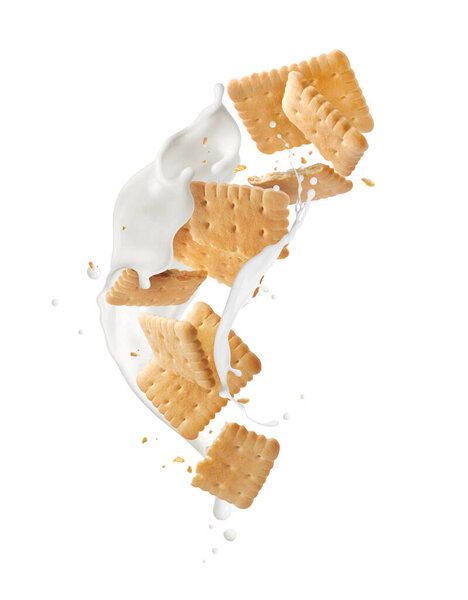 Группа целых и дробленых хрустящих печенек с молочными брызгами в воздухе на белом фоне