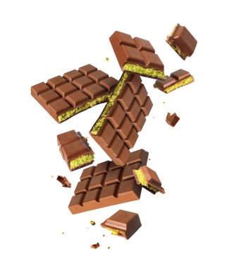 Beyaz arka planda izole edilmiş parçalanmış çikolatanın havada yükselmesi.