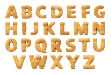 Beyaz arkaplanda izole edilmiş yenilebilir alfabe kurabiyeleri. yazı tipi harfleri A-Z