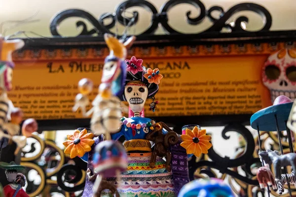 stock image The Mexican catrina is the most representative figure and icon of the Day of the Dead in Mexico, accompanied by colorfully painted clay skulls that are used for decoration during the Day of the Dead.