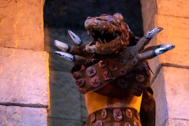 Crocodile warrior and Mayan shaman in Xcaret performing the representation of a pre-Hispanic Mayan dance called the dance of the owl in the jungle of the Mayan Riviera in an ancient Mayan civilization