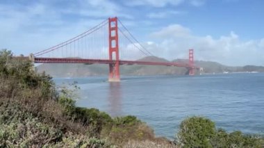 The famous Golden Gate Bridge of San Francisco seen from the viewpoint on the waterfront, is a work of architecture overlooking the unique bay of this Californian city of the United States.