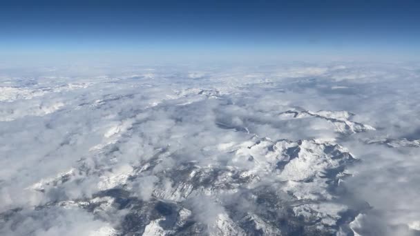 飛行機の窓からグリーンランドとニューファンドランドの景色 アメリカ合衆国とカナダからヨーロッパに飛行しながら アメリカの国際空港から離陸した後 — ストック動画