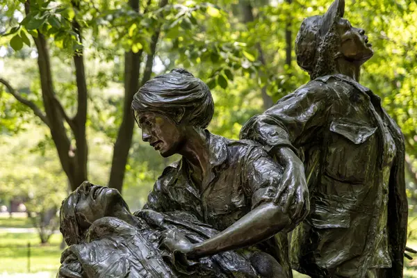 The bronze monument statue of the women who participated in the Vietnam War, which is located on the National Mall in Washington DC, USA.