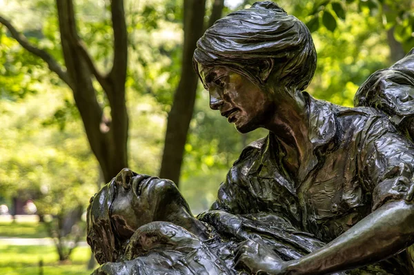 Bronze statue of the monument and memorial to women veterans who participated in the Vietnam War, located on the National Mall in Washington DC (USA).