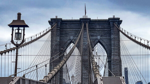 The famous and wonderful Brooklyn Bridge linking the boroughs of Manhattan and Brooklyn in New York City (USA).