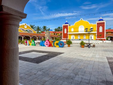 Cancun, Mexico; September 27, 2023: The central plaza of the Isabel hacienda is the ideal place to experience the traditional Mexican party when enjoying a summer vacation at the Bahia Principe. clipart