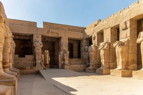 stock image Luxor, Egypt; January 16, 2024: The intricate carvings and ornate designs on the columns of the Temple of Ramesses III. These architectural masterpieces showcase the artistic achievements.