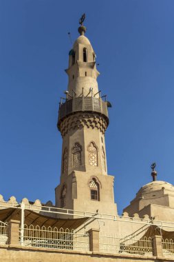 Coexistence of ancient Egypt and Islamic Egypt at the Abu Haggag Mosque. Located inside the Temple of Luxor, this mosque shows the reuse of ancient columns. clipart