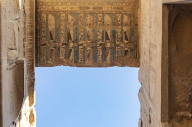 Kom Ombo, Egypt; January 17, 2024: The walls of the temple of Kom Ombo, an impressive monument on the banks of the Nile River. Discover the meaning of the hieroglyphs and paintings of the temple. clipart