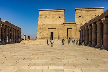 Aswan, Egypt; January 18, 2024: Visiting the Philae Island temple with the Shrine of Isis in Aswan. This ancient Egyptian temple dedicated to Isis is located on the beautiful island of Philae. clipart