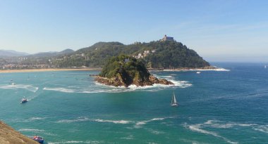 Spain, San Sebastian, view of the Isla de Santa Clara Lighthouse from Mount Urgull