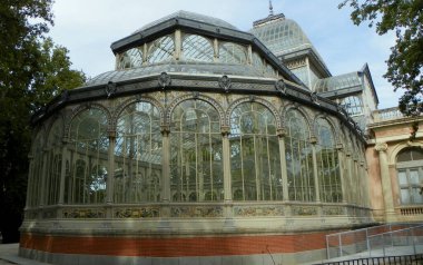 Spain, Madrid, El Retiro Park, Palacio de Cristal, glass walls with a metal frame
