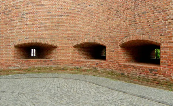 stock image Poland, Warsaw, street Podwale, barbican of Warsaw, inner courtyard of the tower, three loopholes