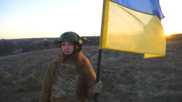 Female Military Medic Walking Field Waving Flag Ukraine Ukrainian Girl — Vídeos de Stock