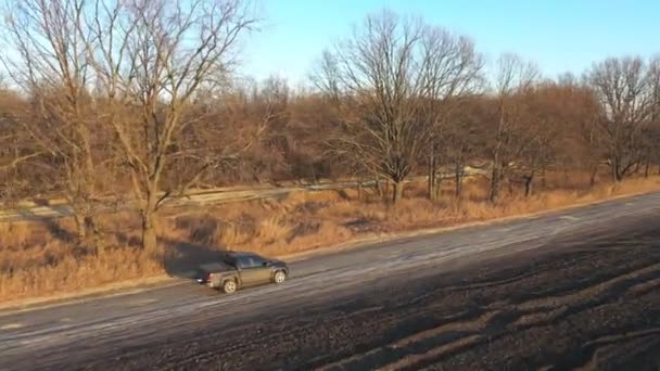 Aerial Shot Car Moving Road Plowed Meadow Autumn Flying Pickup — Stock Video