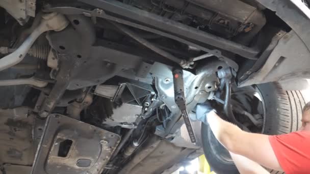 Mechanic Working Lifting Vehicle Auto Service Professional Repairman Fixing Car — Stock Video