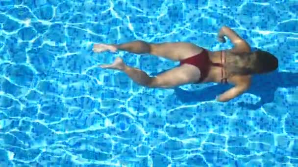 Unrecognizable Woman Red Bikini Swimming Water Pool Transparent Clear Water — Stock video
