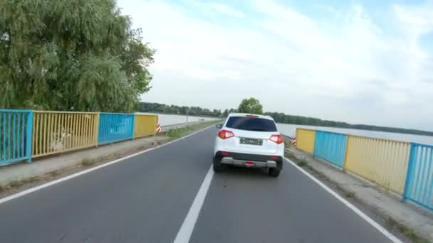 Drone Follow White Car Riding Dam Road Suv Driving Beautiful — Stock Video