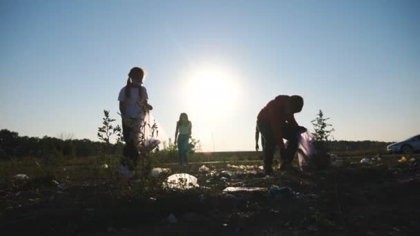 Family Eco Activists Gloves Cleaning Meadow Plastic Paper Waste Young — Video Stock
