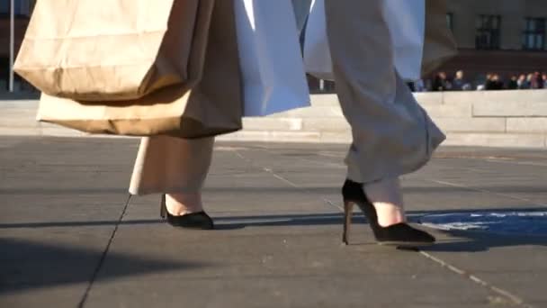Young Female Customer Holds Shopping Bags Walking Sidewalk Purchases Fashionable — Video Stock