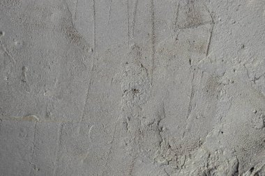 Çimentonun pürüzlü dokusu. Bahçede yeni güçlendirilmiş bir yolun dokusu..