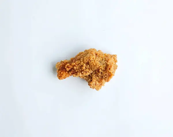 stock image Fried chicken wing on white background top view