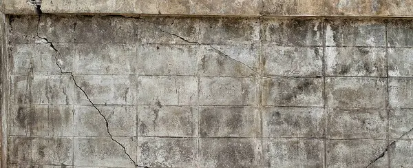 stock image Cracks on the old cement wall