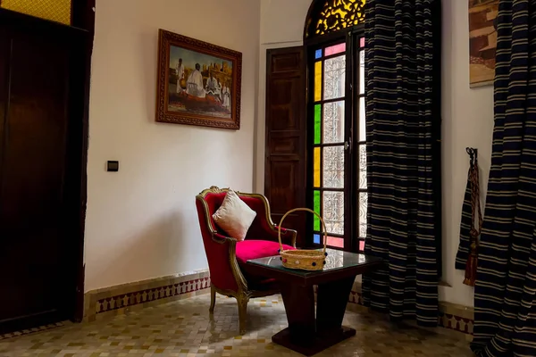 Authentic Moroccan bedroom interior with traditional furnitures in a guest house