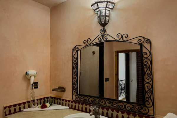 The interior of a traditional riad\'s bathroom in Morocco