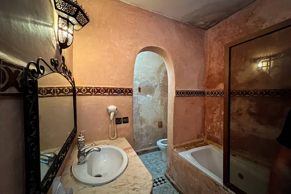 The interior of a traditional riad\'s bathroom in Morocco