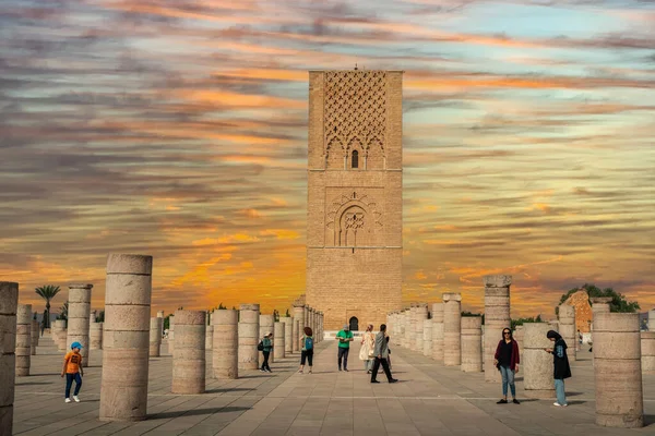 stock image People walking around the medieval columns next to the Hassan tower in Rabat, Morocco