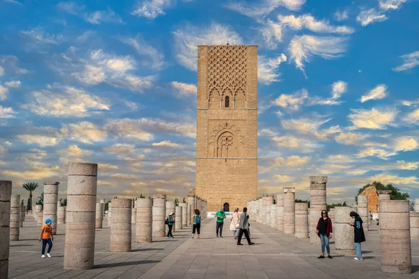 stock image People walking around the medieval columns next to the Hassan tower in Rabat, Morocco