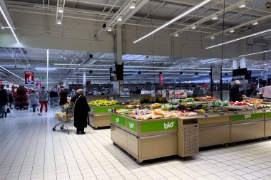 People shopping inside a modern supermarket in Brussels, Belgium