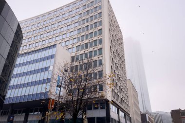 Low angle view of buildings during a hazy day in Brussels, Belgium