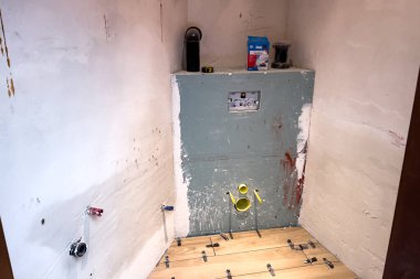 Bathroom renovation in the procession inside a modern apartment