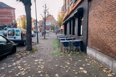 Tables and chairs in the terrace of a coffee shop in Brussels, Belgium