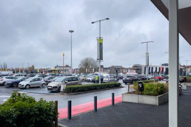 Cars parked in an outdoor parking lot in Brussels, Belgium