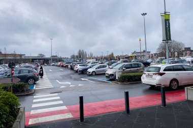 Cars parked in an outdoor parking lot in Brussels, Belgium